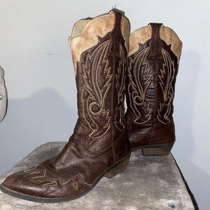 Brown and tan embroidered cowboy boots